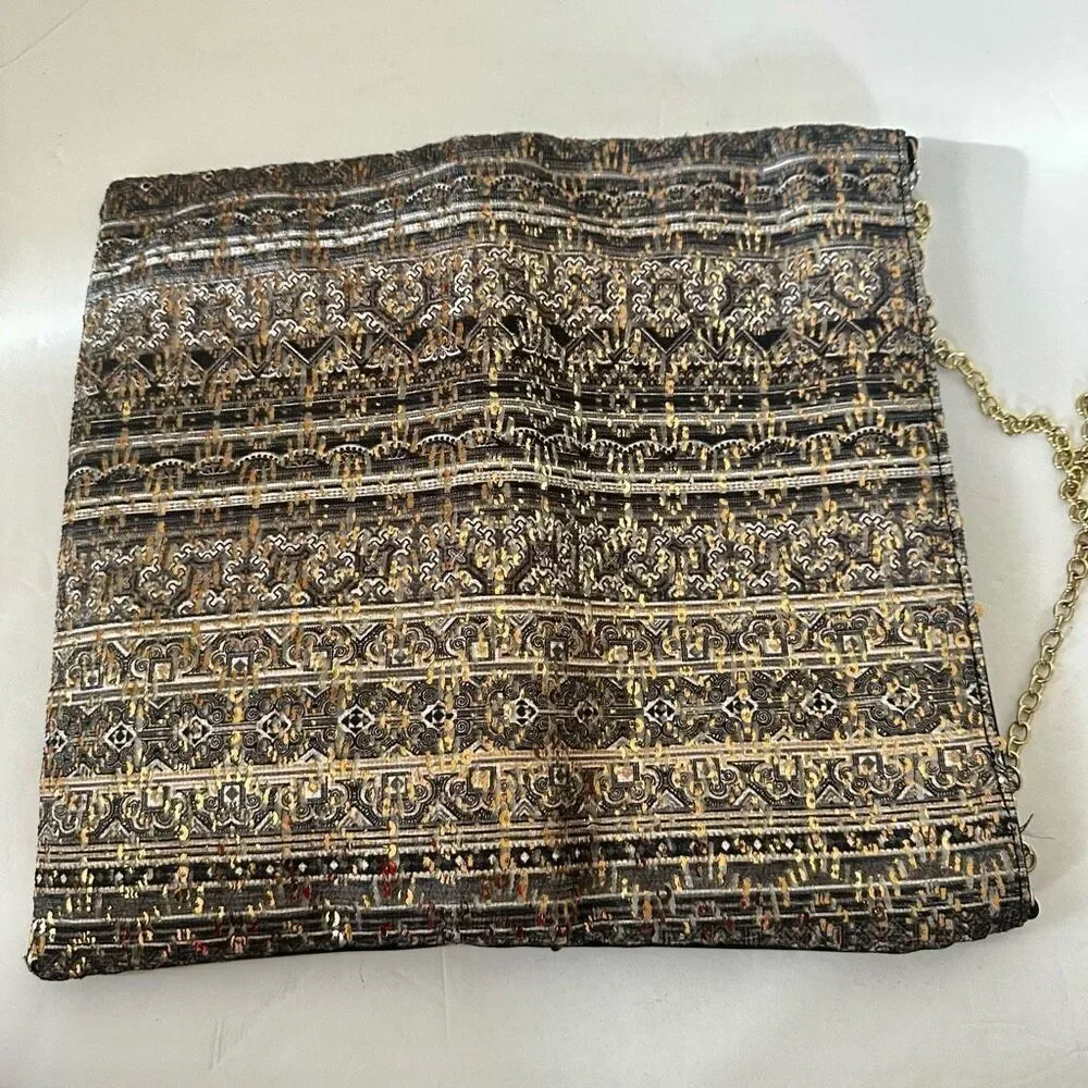 La Je  expandable clutch purse
